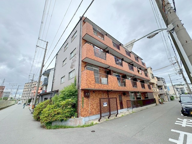 かねまつ上新庄マンションの外観
