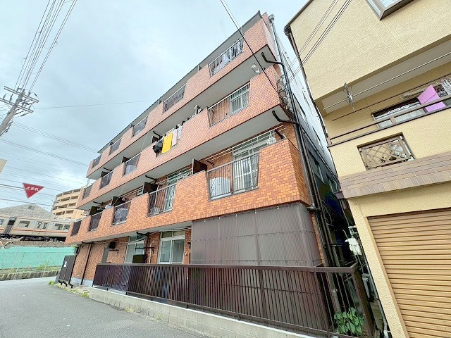かねまつ上新庄マンションの外観