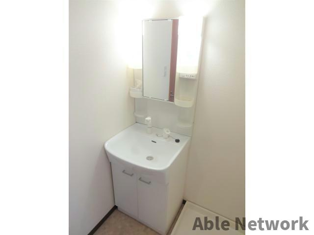 スプリームつつい.Ⅱの洗面所|シャワー付洗面台