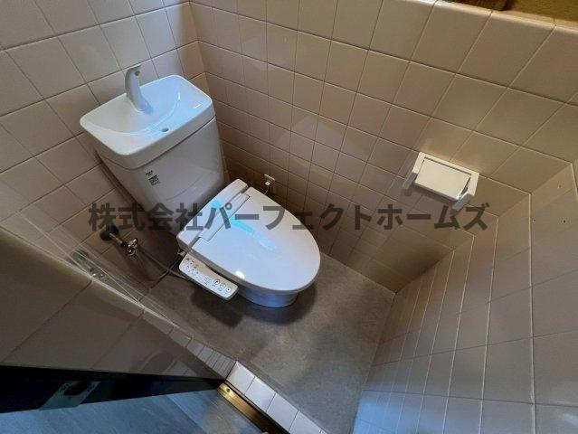 香里園町戸建　賃貸のトイレ|落ち着いたトイレです