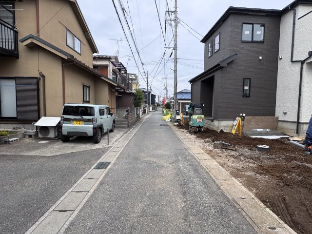 松戸市高塚新田152番の前面道路含む現地写真|西側前面道路