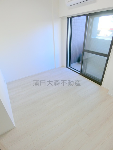 GRAN PASEO蒲田Ⅲの居間・リビング|洋室5帖　