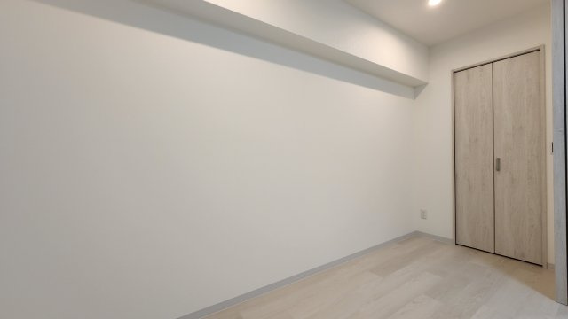 ピアッツァレント八木駅前の洋室|収納付きベッドコーナー３.６帖