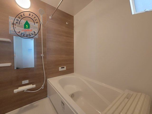 糟屋郡宇美町とびたけ3丁目第2-1棟（1号棟）の内観：施工例|1日の疲れを癒してくれる広々バスルーム。雨の日のお洗濯にも大活躍な浴室乾燥機付です！