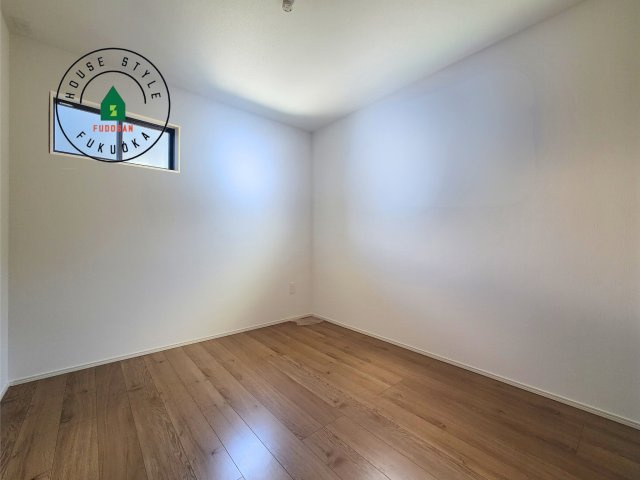 糟屋郡宇美町とびたけ3丁目第2-1棟（1号棟）の内観：施工例|落ち着いた色調の洋室です。