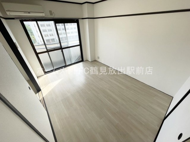 大阪市城東区永田３丁目の賃貸マンションの洋室