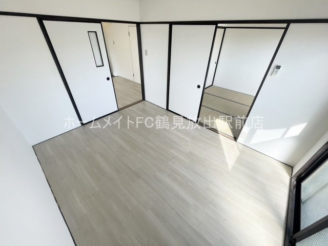 大阪市城東区永田３丁目の賃貸マンションの洋室