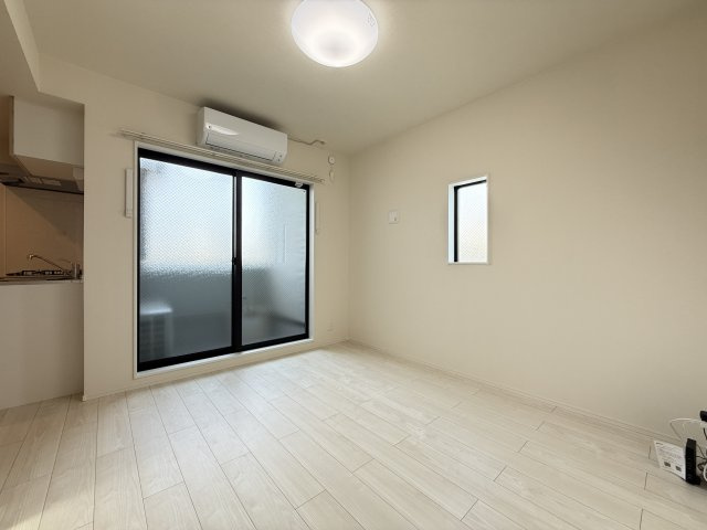 ハーモニーテラス遠里小野Ⅲの居間・リビング