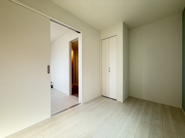 ハーモニーテラス遠里小野Ⅲの居間・リビング