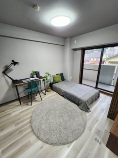 【洋室】 | ヴェール牛田 | 6帖洋室　リビング横で開放するとさらに広々とした空間に　※同タイプのモデルルーム写真となります。現況優先。