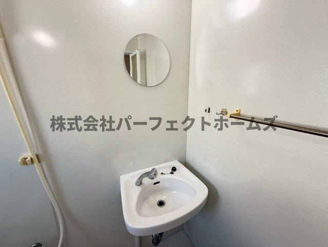 香里ヶ丘日東マンションD棟の洗面所|コンパクトで使いやすい洗面所