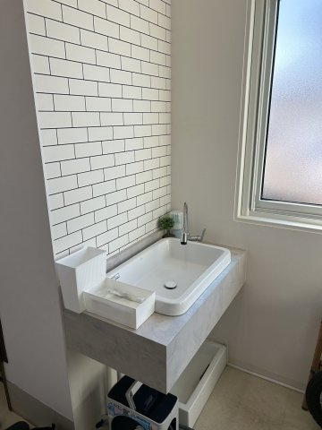 河畔4丁目　中古住宅の玄関|玄関手洗い