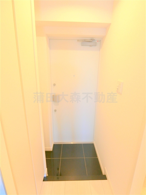 メイクスデザイン糀谷アジールコートの玄関