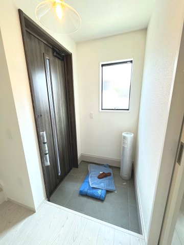 【玄関】 | 福岡市城南区神松寺1丁目3期　2号棟（全2棟）【仲介手数料無料・0円】 | 現地写真。