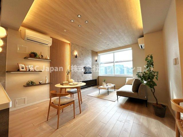 東京シーサウスブランファーレの居間・リビング|優しくリビングに注ぐ日差しはまるで「陽だまり」の様な暖かさ。高い断熱性は床暖房やエアコンを使いすぎず快適な居住空間を創造しています。