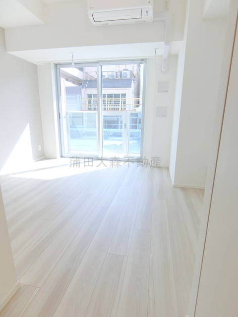 スタイリオ蒲田WESTの居間・リビング|南向きの洋室7帖