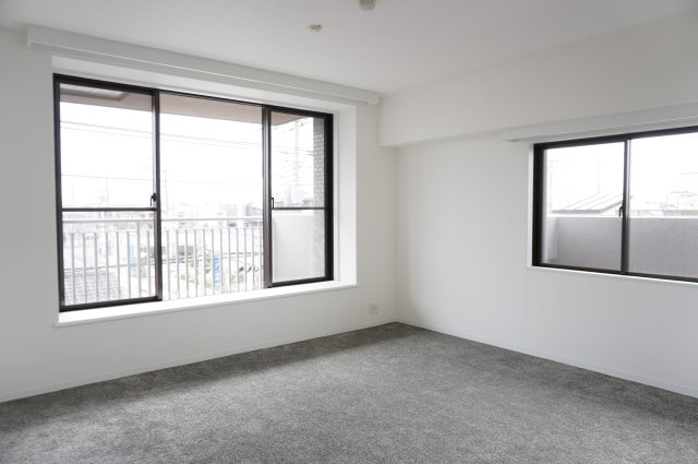 草加パーク・ホームズの居間・リビング