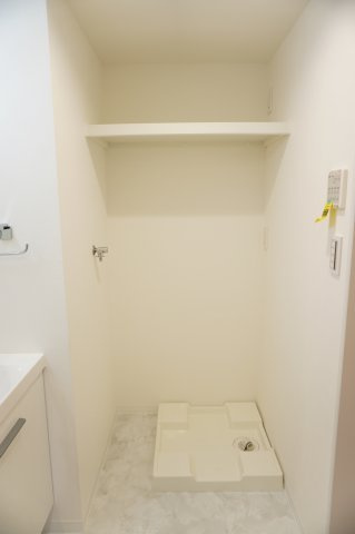 草加パーク・ホームズのランドリースペース