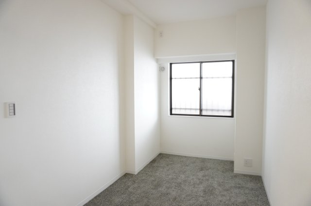 草加パーク・ホームズの洋室