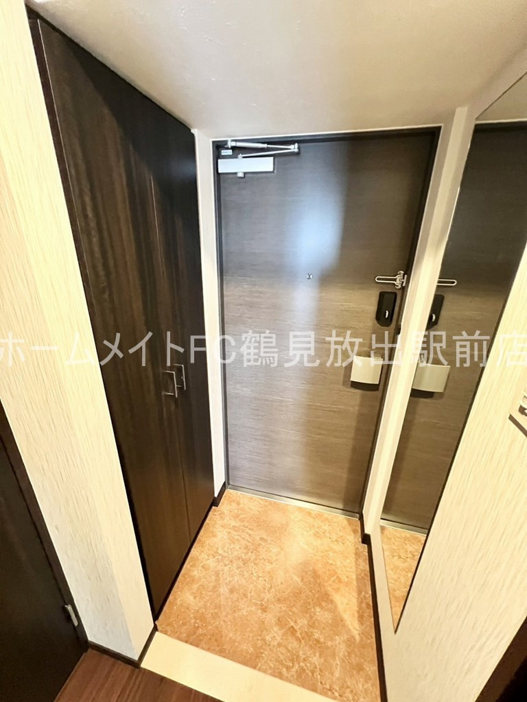 プレジオ城東の玄関