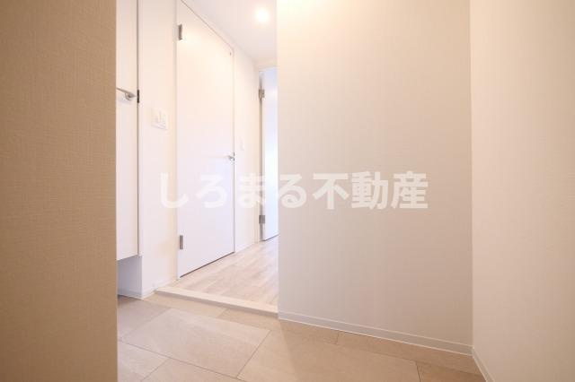 コンフォリア・リヴ南森町Ⅱの玄関