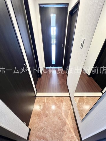 プレジオ城東の玄関