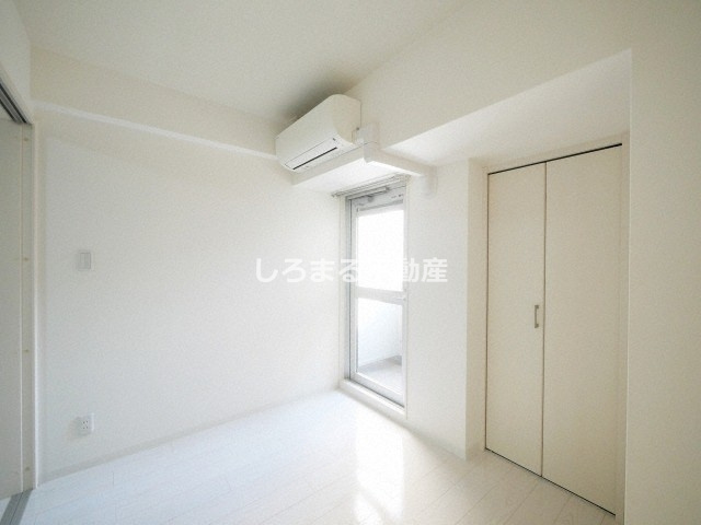 ドュ シンビオス桜川の洋室