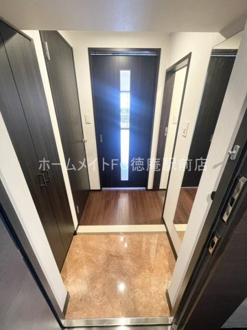 大阪市城東区今福南３丁目の賃貸マンションの玄関