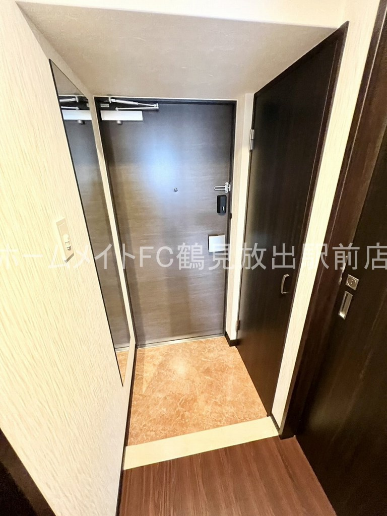 大阪市城東区今福南３丁目の賃貸マンションの玄関