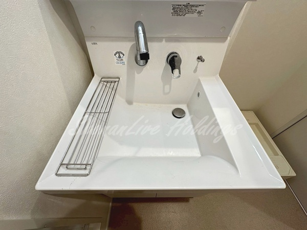 平塚市桃浜町のアパートの洗面所|※同施工