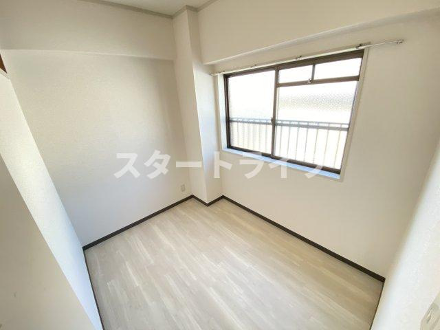 大阪市東淀川区下新庄６丁目の賃貸マンションの寝室
