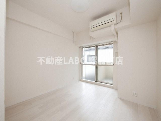 メゾン夕陽ヶ丘の洋室