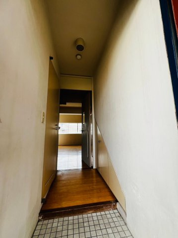 ソレイユ王塚台の玄関