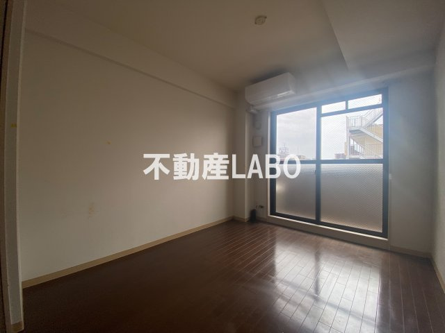 ジュネーゼグラン南堀江の居間・リビング