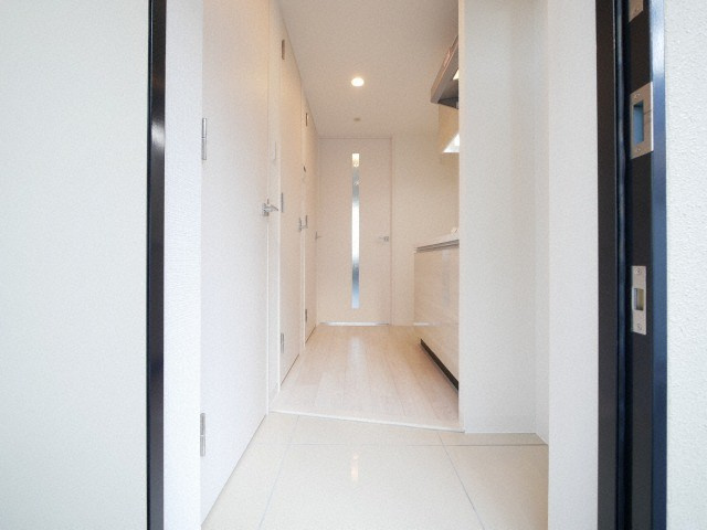 大阪市北区大淀北１丁目の賃貸マンションの玄関