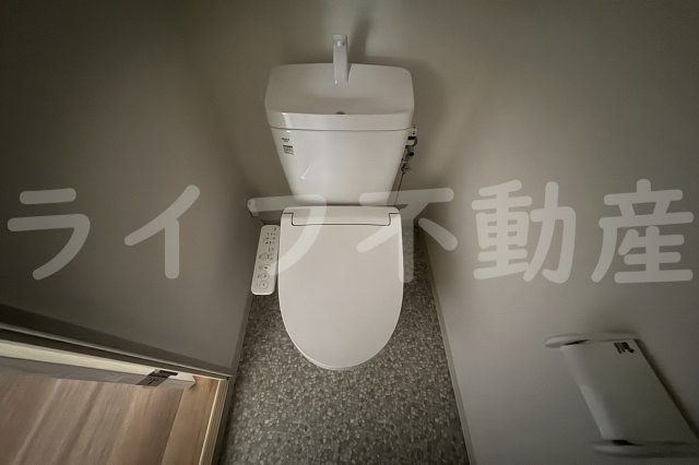 幸田マンション新深江　のトイレ|落ち着いた色調のトイレです