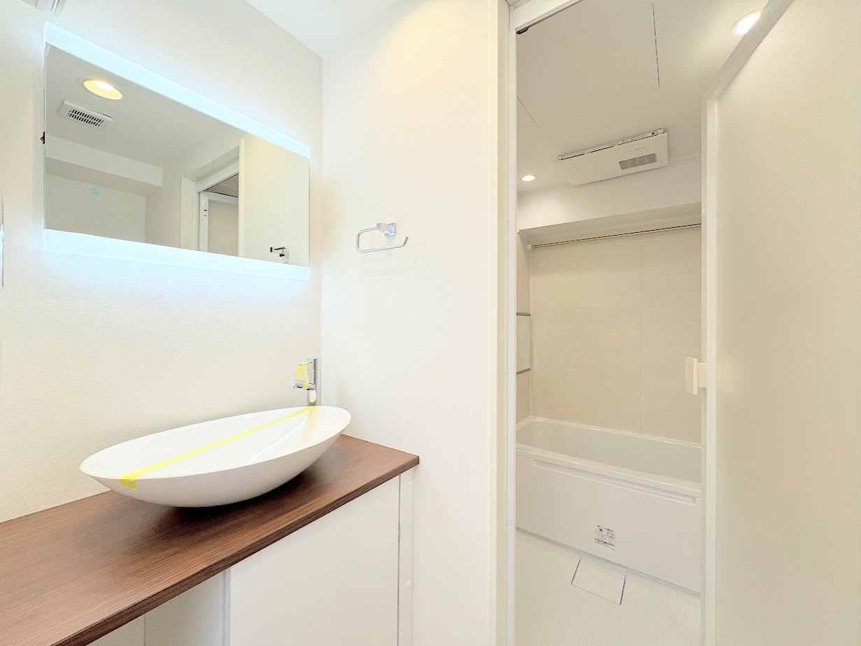 中山ダイヤモンドマンションの脱衣所|◆毎日使う場所だから、機能的で使いやすさに配慮したパウダールーム。