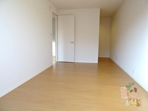 Ｍヴィラージュの居間・リビング|洋室