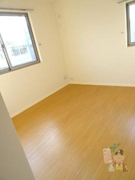 Ｍヴィラージュの居間・リビング|洋室