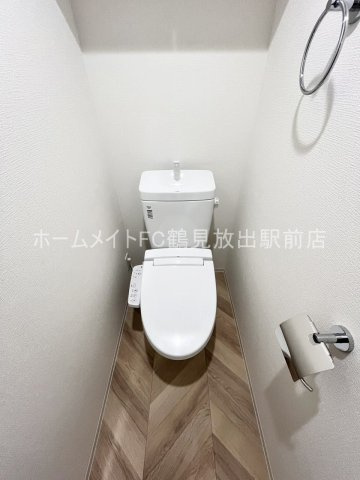 大阪市城東区放出西３丁目の賃貸マンションのトイレ