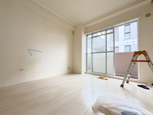 エクセレント上新サンウイングの洋室