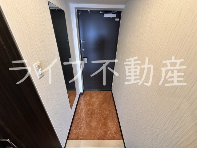 プレジオ森河内ASIANの玄関