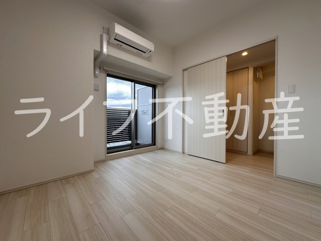 プレジオ森河内ASIANの寝室