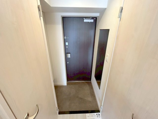 プレサンスNEO上新庄PRIMECRUISの玄関