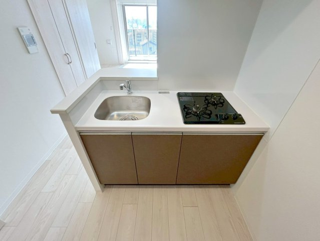 プレサンスNEO上新庄PRIMECRUISのキッチン