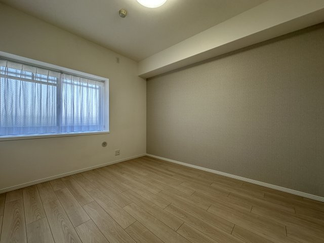 アバンドーネ西神春日台６号棟の洋室