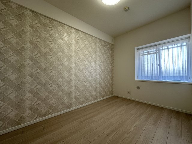 アバンドーネ西神春日台６号棟の洋室