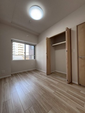 アルファレックス南11条の洋室