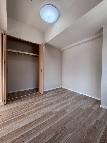 アルファレックス南11条の洋室