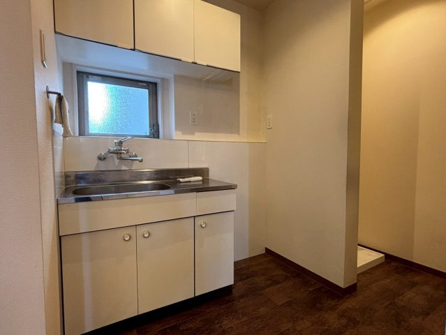 光の森　店舗付き住宅のキッチン|１階店舗スペース　キッチン